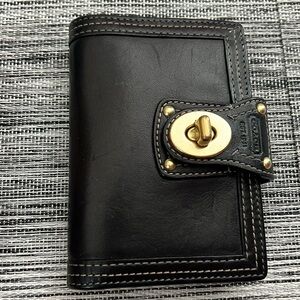 Coach brass turn lock address book with gold pen
